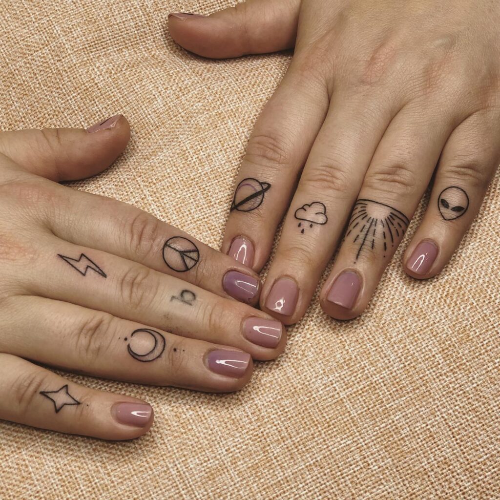 Leaf And Star Finger Tattoos With Hand Script