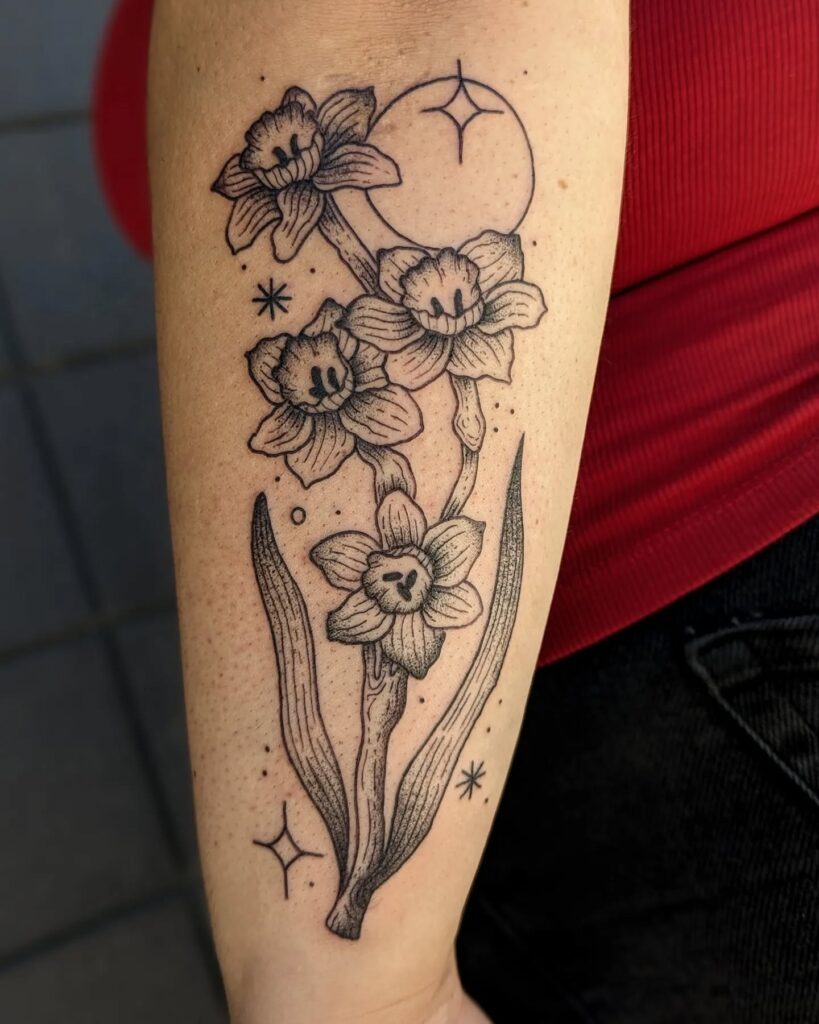 Playful Narcissus Tattoo with Cosmic Accents december birth flower tattoo ideas tattoo
