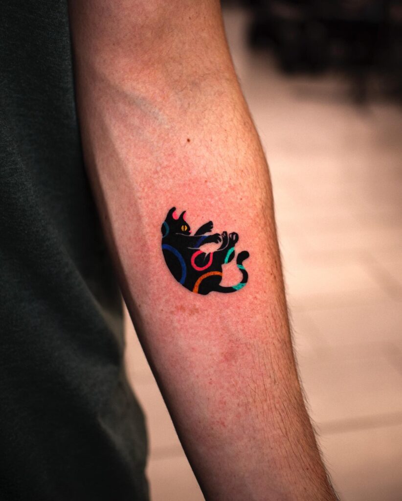 Playful Rainbow Cat Tattoo small cat tattoos tattoo