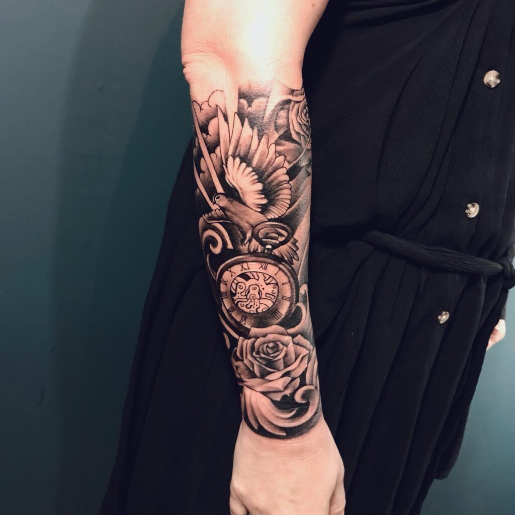 Butterfly, Flower, And Eye Half Sleeve Tattoo