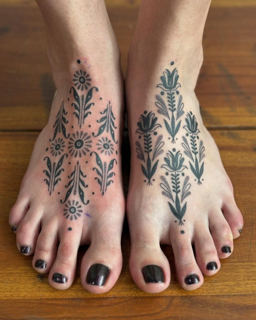 Vibrant Cherry Blossom Branch Foot Tattoo