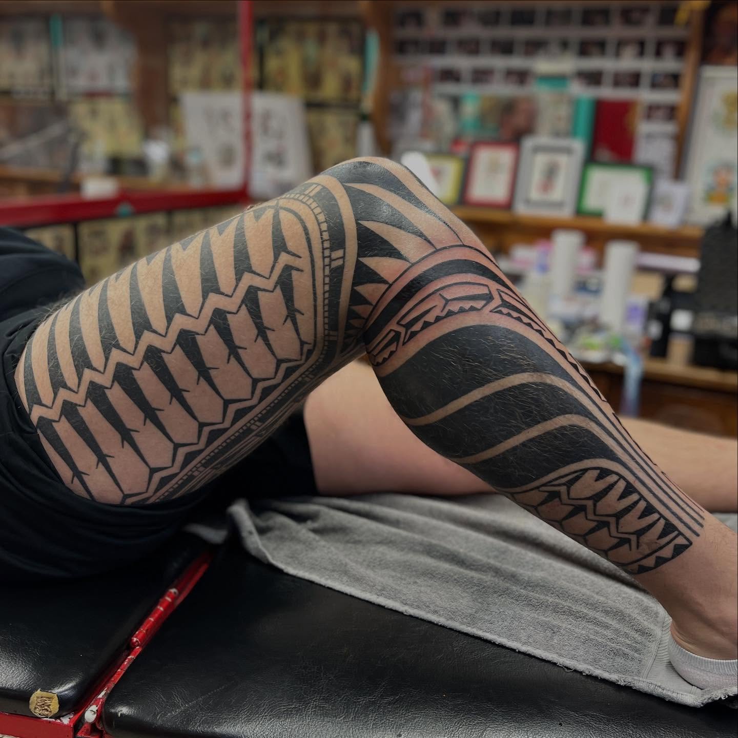 Bold Polynesian Leg Sleeve Tattoo