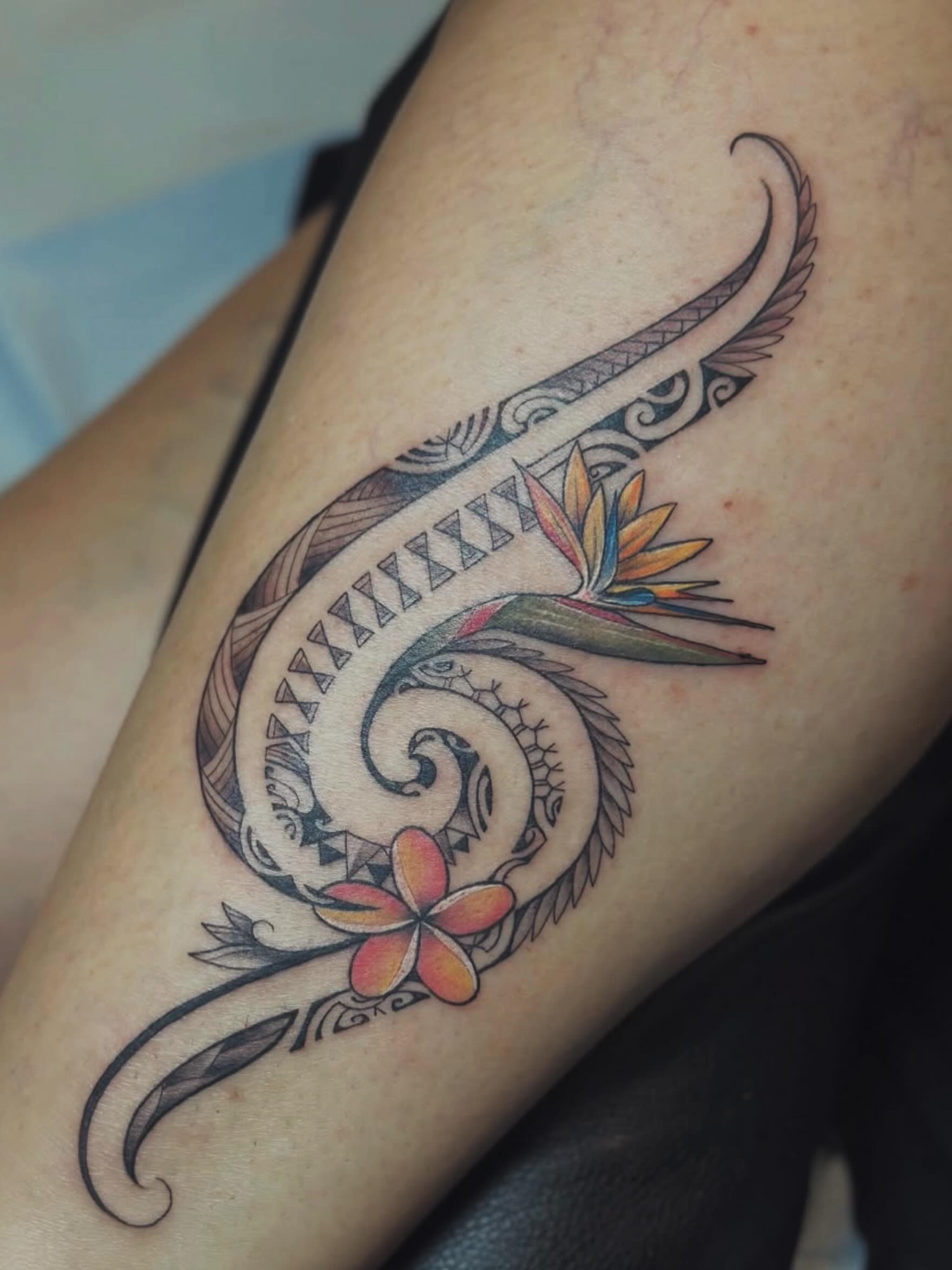 Floral Polynesian Spiral Tattoo
