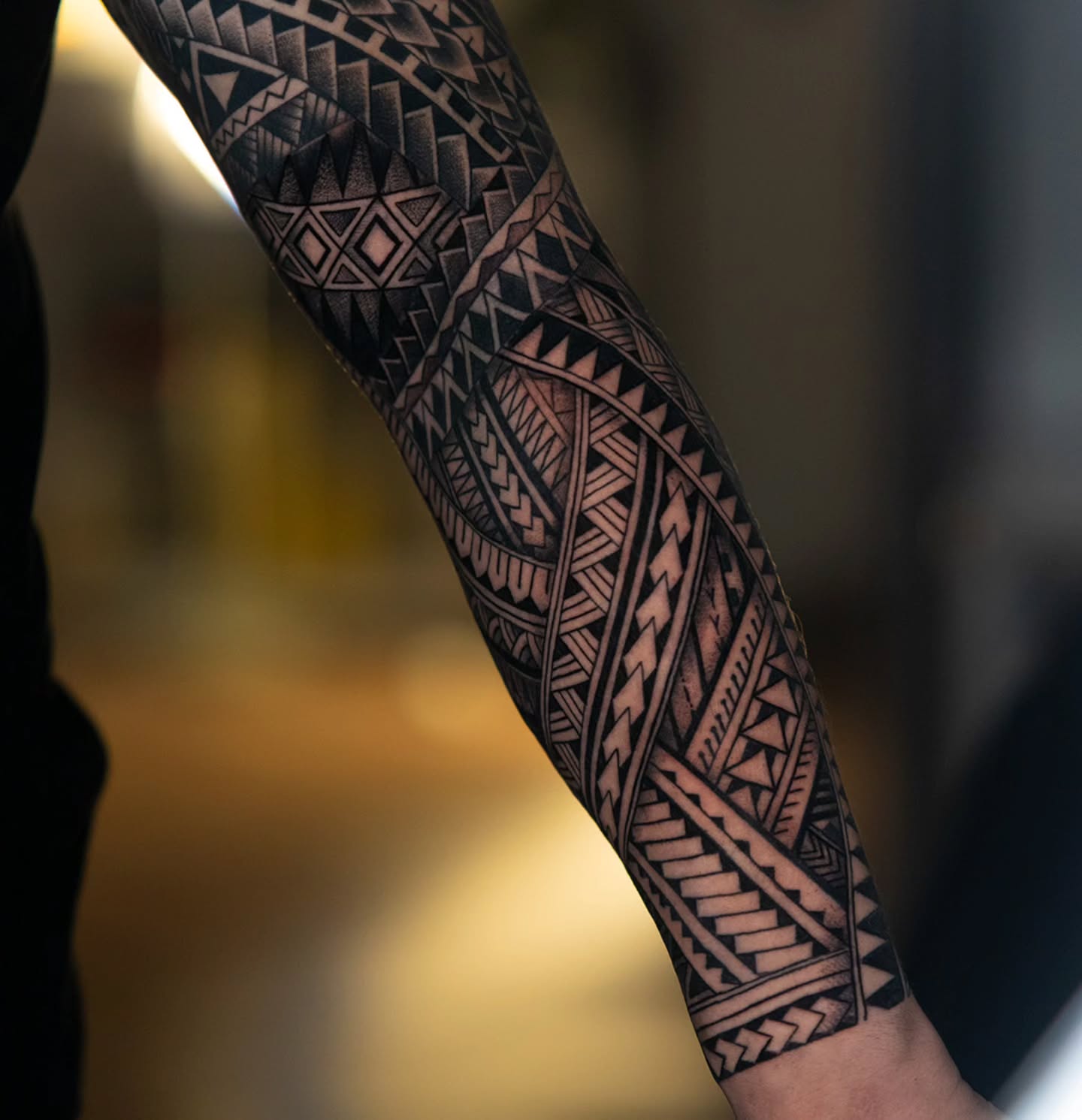 Geometric Polynesian Forearm Tattoo