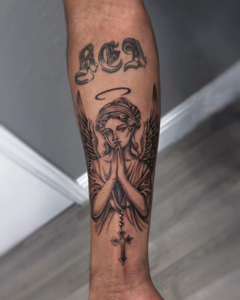 Praying Angel with Rosary Tattoo angel tattoo ideas tattoo