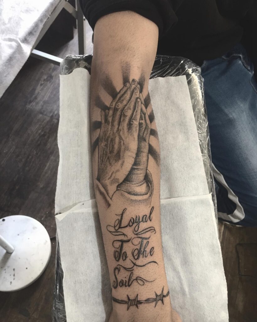 Praying Hands with Rays and Loyalty Script Tattoo praying hands tattoos tattoo