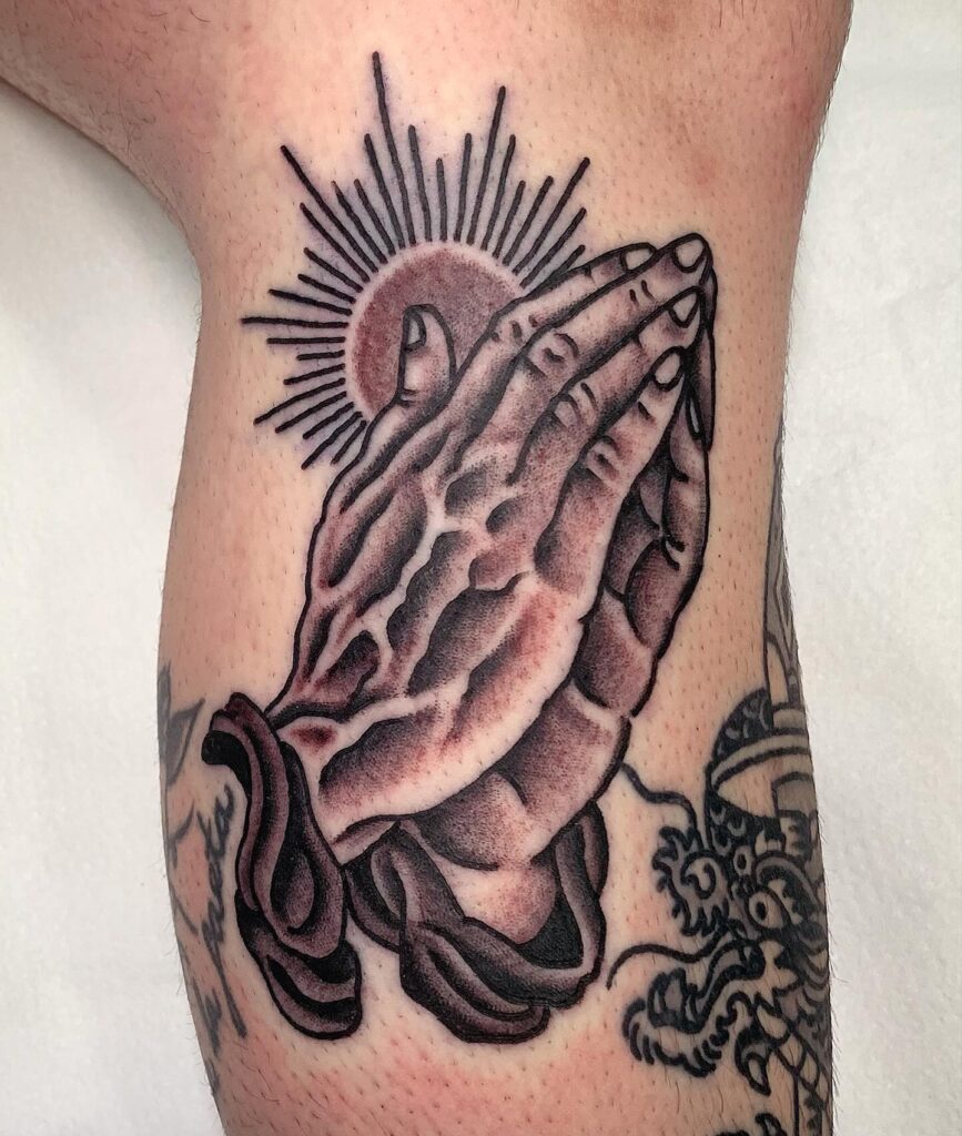 Praying Hands with Sunburst Tattoo praying hands tattoos tattoo