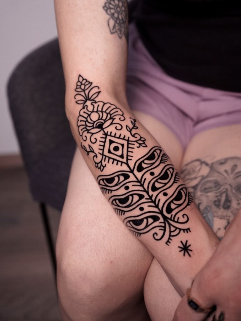 Yin Yang And Spiral Hamsa Forearm Tattoo
