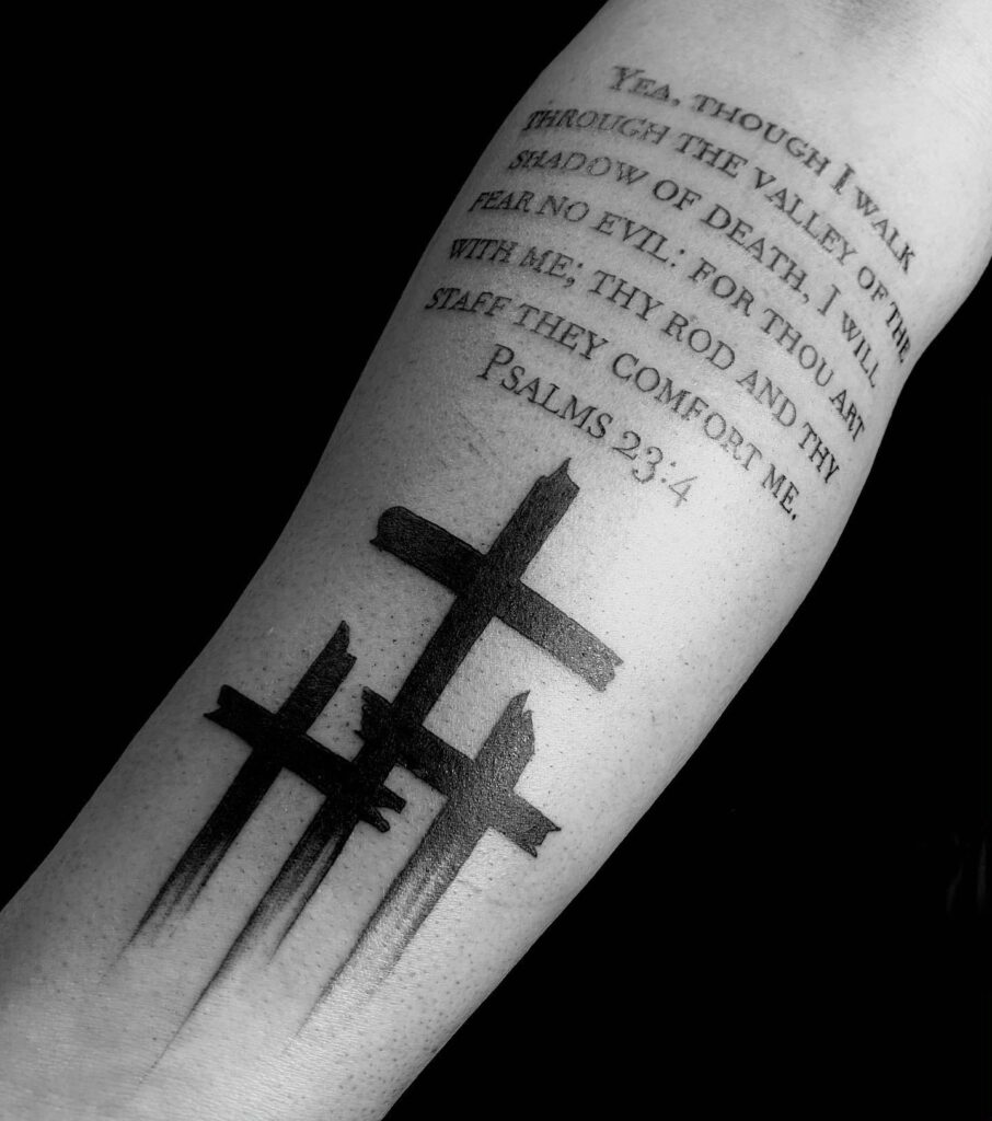 Romans 8:18 Forearm Tattoo with Three Crosses bible verse tattoo ideas for men tattoo