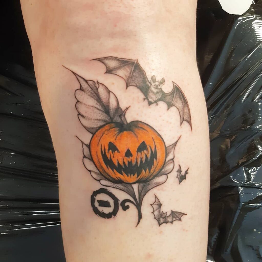 Delicate Pumpkin With Whimsical Vines Tattoo Design