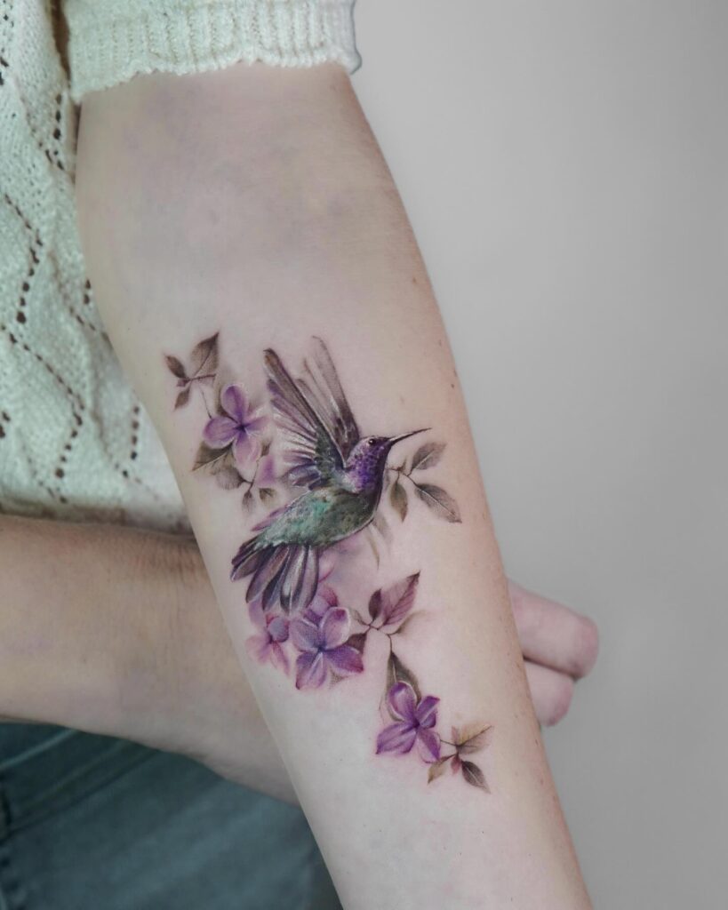 Purple Hummingbird with Blossoms Tattoo hummingbird tattoos tattoo