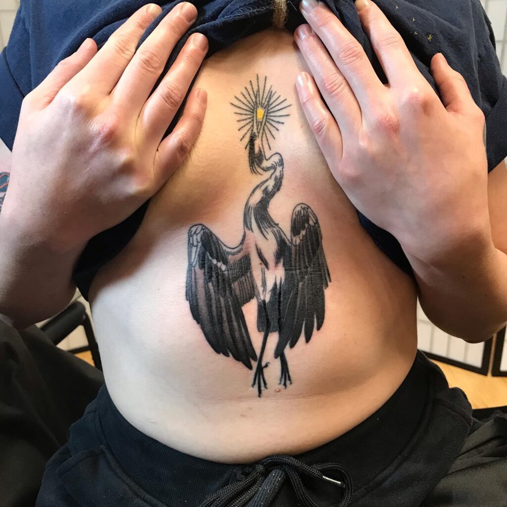 Cranes with Blossoms and Mystical Sun Tattoo mystical tattoos tattoo