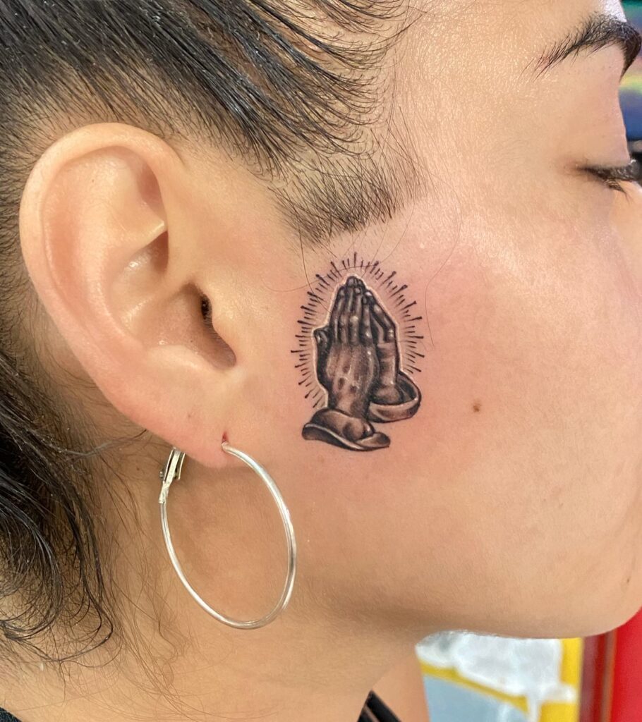 Radiant Praying Hands Face Tattoo praying hands tattoos tattoo