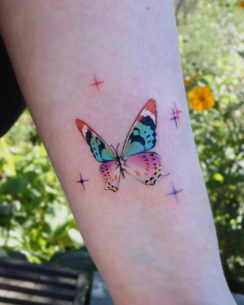 Rainbow Butterfly with Sparkles Tattoo butterfly tattoo designs tattoo