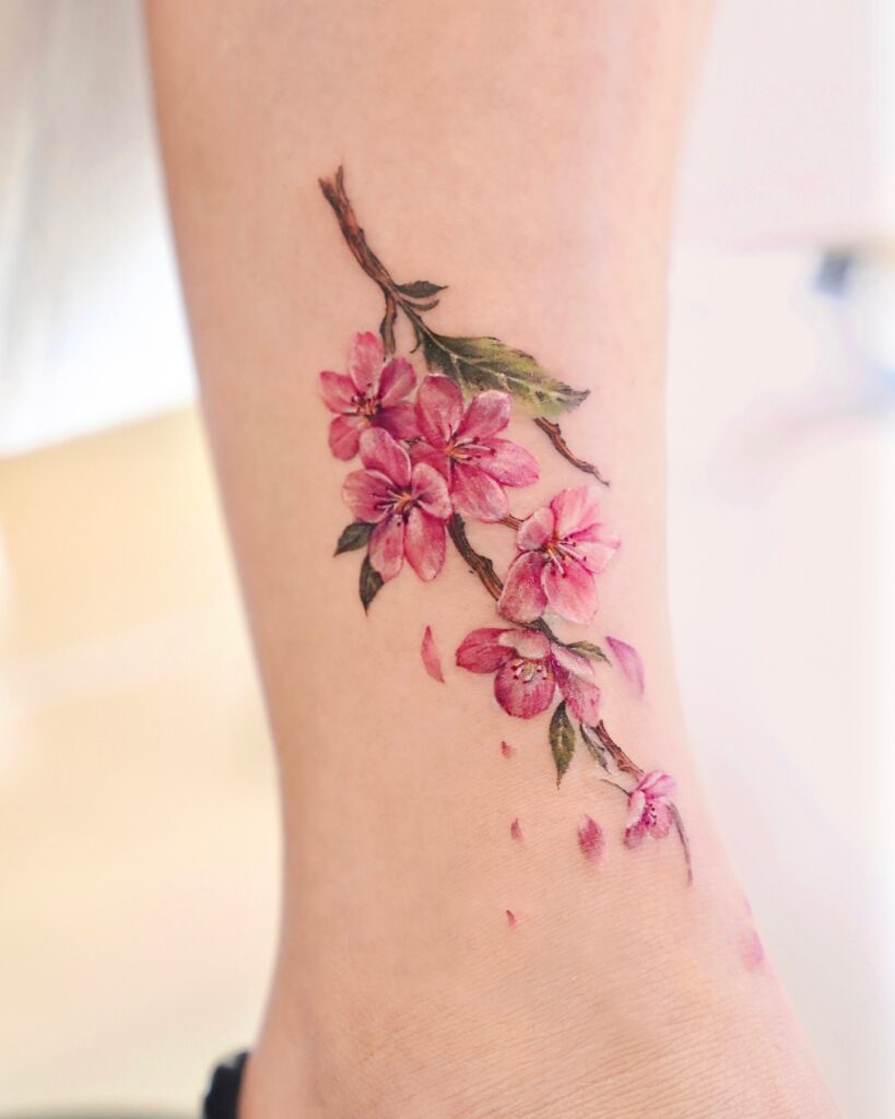 Realistic Cherry Blossom Ankle Tattoo cherry blossom tattoo ideas tattoo