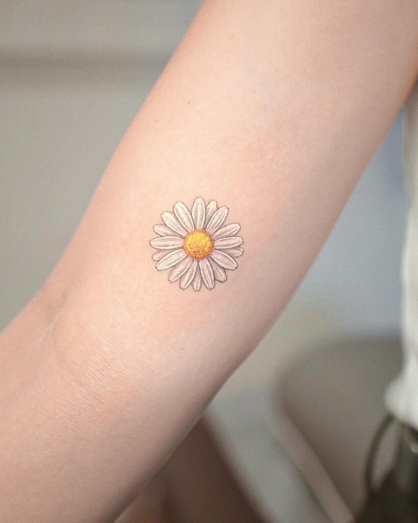 Realistic Daisy Tattoo on Forearm april birth flower tattoo ideas tattoo