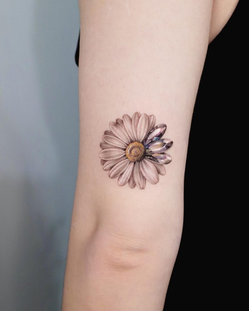 Realistic Daisy with Gemstone Petals Tattoo april birth flower tattoo ideas tattoo