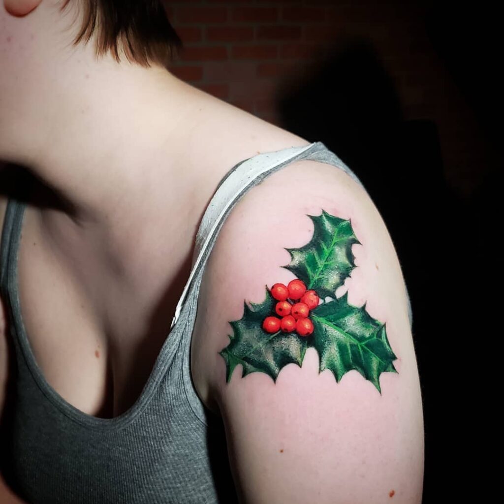 Realistic Holly Shoulder Tattoo with Vivid Color december birth flower tattoo ideas tattoo