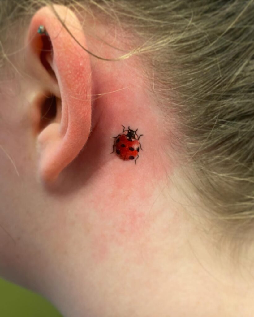 Delicate Green Leaf Behind Ear Tattoo
