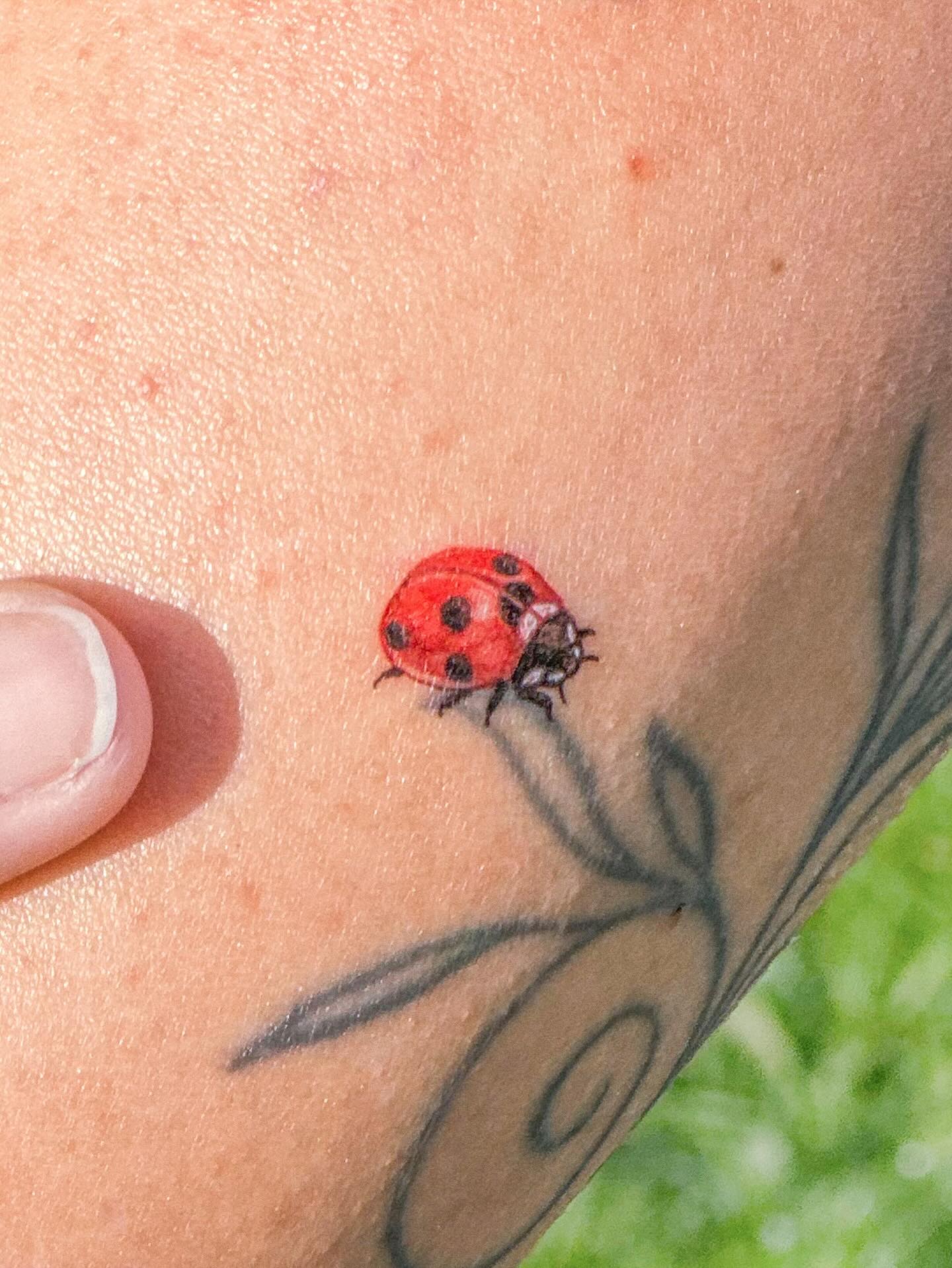 Ladybug And Four-Leaf Clover Tattoo