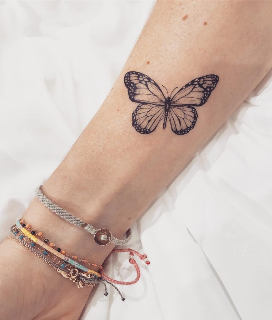 Monarch butterfly tattoo on forearm
