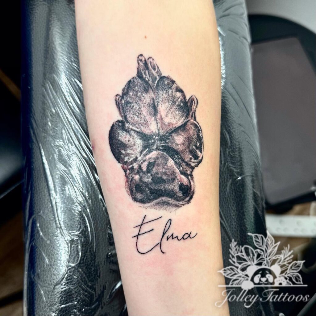 Realistic Paw Print Tattoo with Name paw print tattoo ideas tattoo