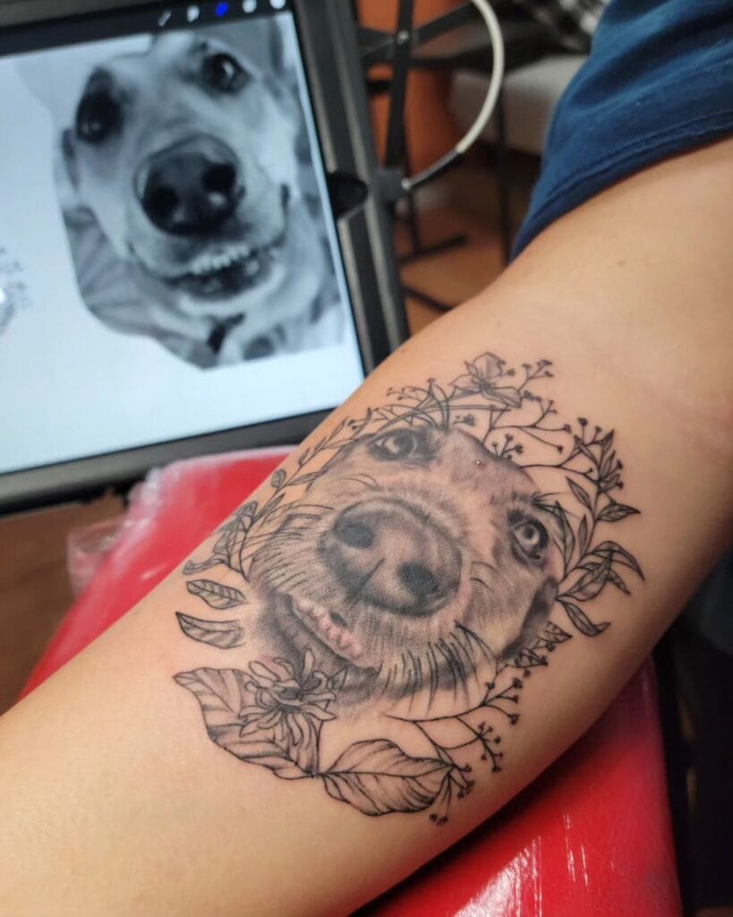 Realistic Portrait of a Dog&rsquo;s Face with Floral Elements pet memorial tattoos tattoo