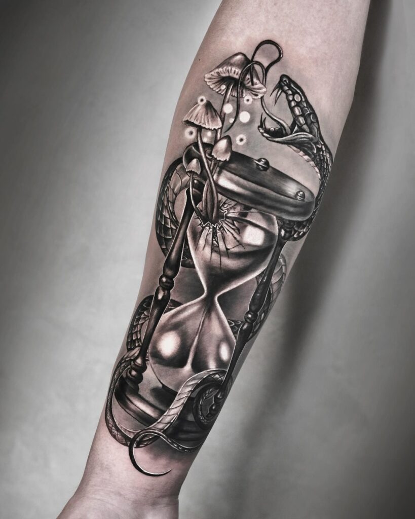 Realistic Snake and Hourglass Forearm Tattoo hourglass tattoo ideas tattoo