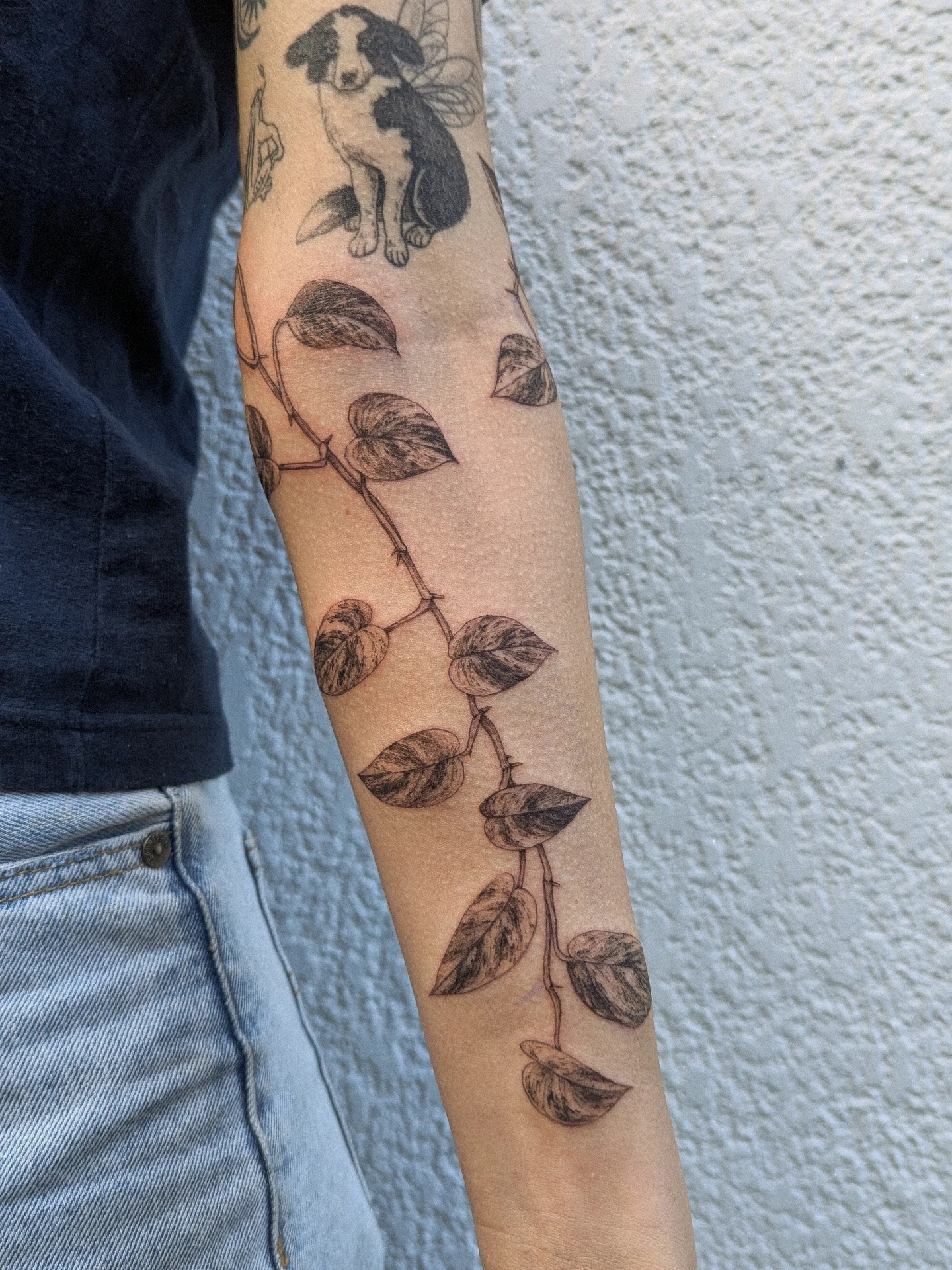 Colorful Flower Vine Tattoo on the Arm vine tattoos tattoo