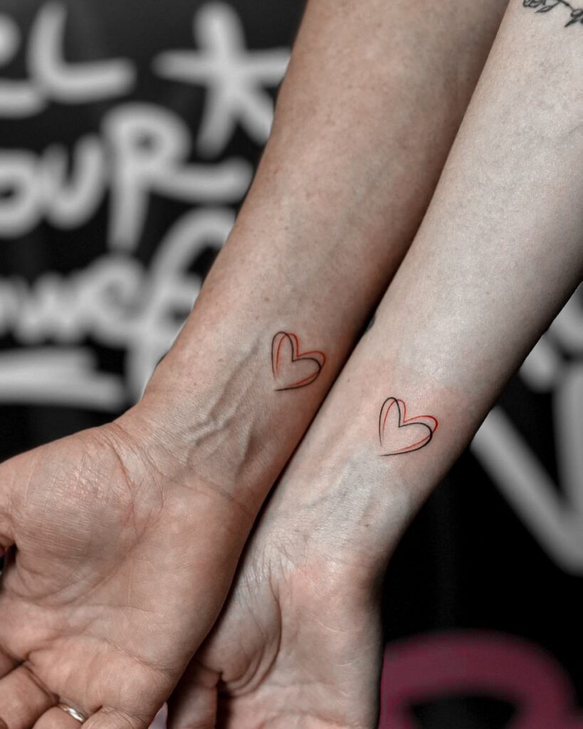 Red and Black Heart Couple Tattoos small couple tattoos tattoo