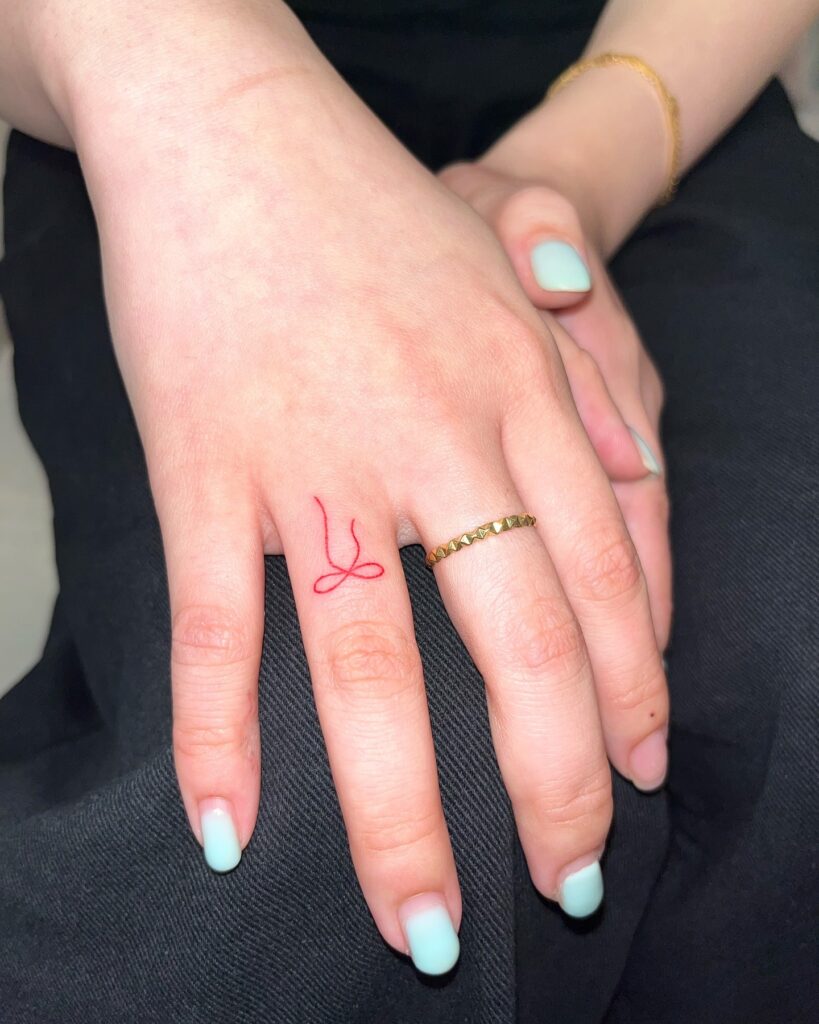 Simple Leaf Stem Finger Tattoo