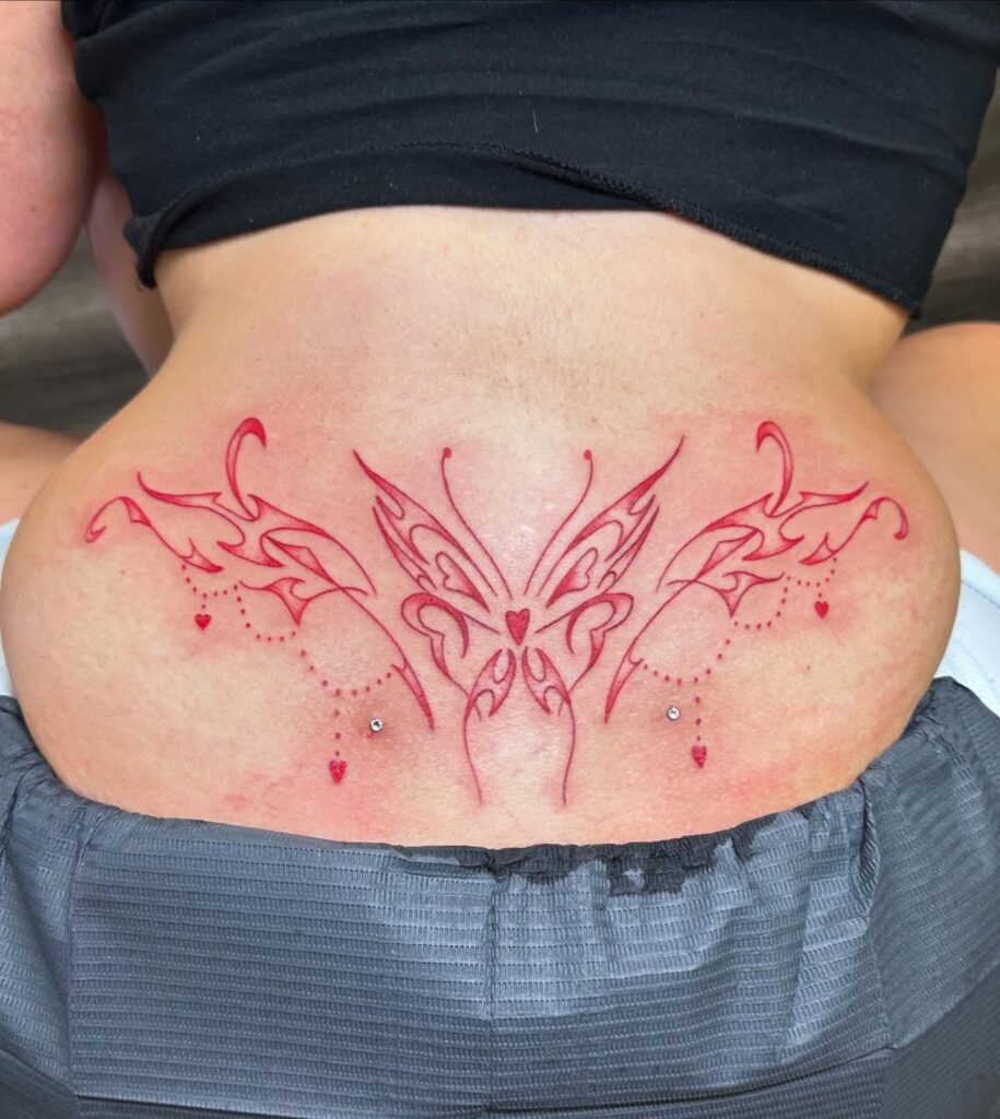 Dragonfly And Lotus Lower Back Tattoo