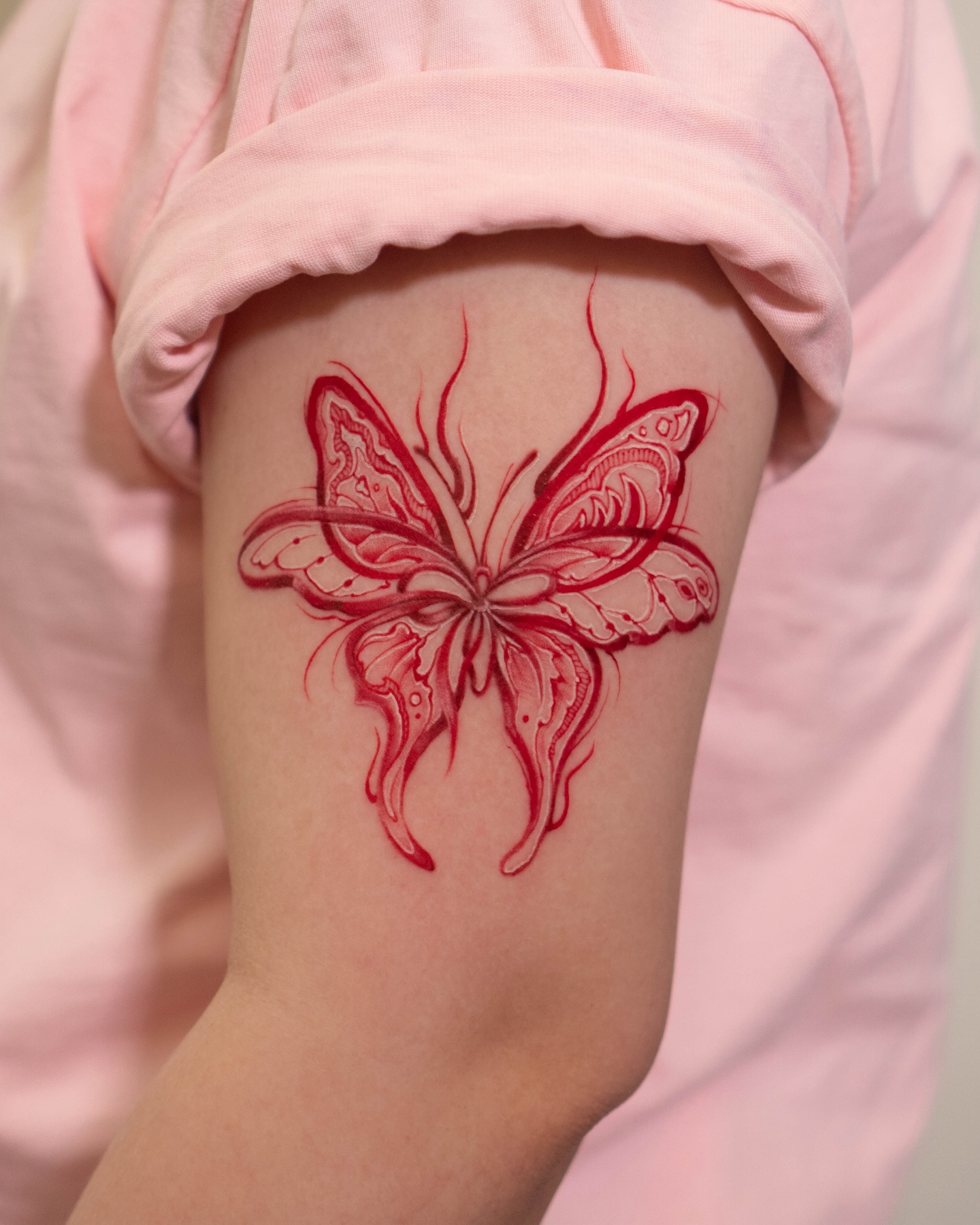 Red Butterfly Upper Arm Tattoo butterfly tattoos designs tattoo
