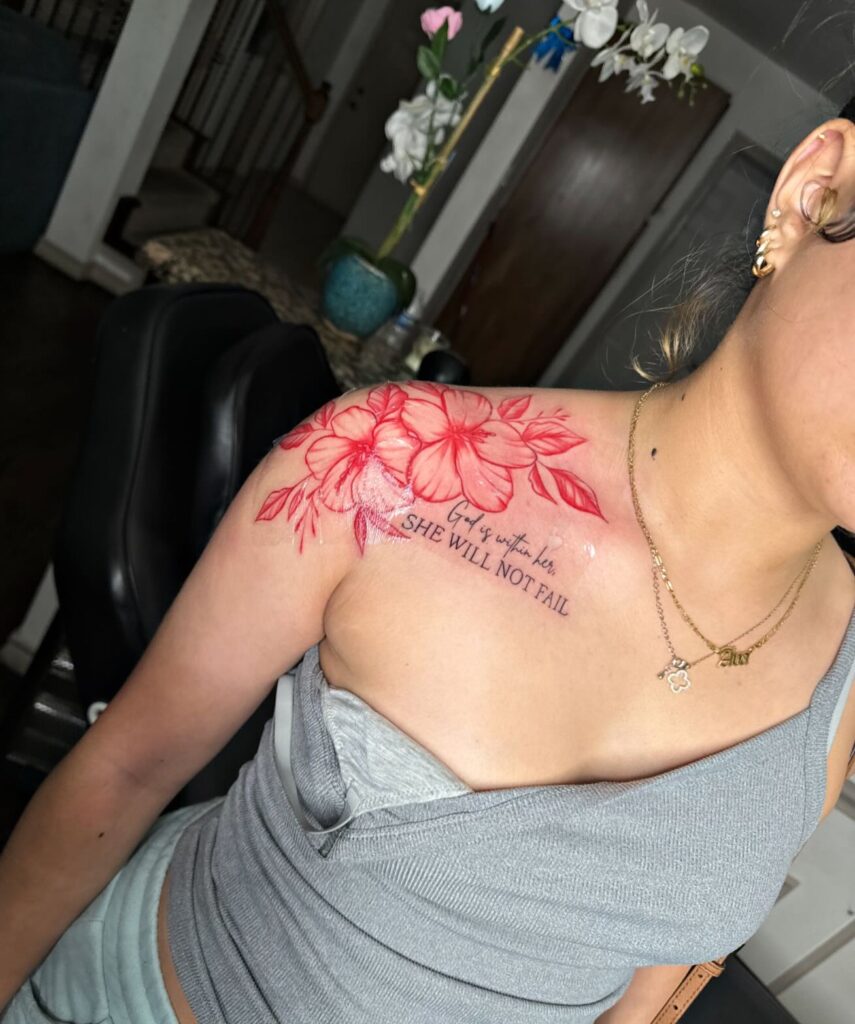 Red Floral Shoulder Tattoo with Inspirational Quote women shoulder flower tattoo ideas tattoo