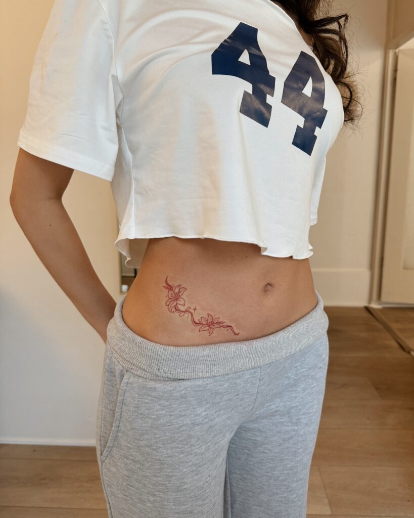 Red Floral Vine Hip Tattoo