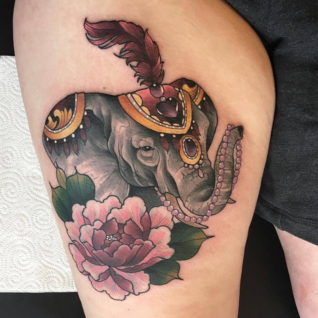 Regal elephant with jewel and peony tattoo
