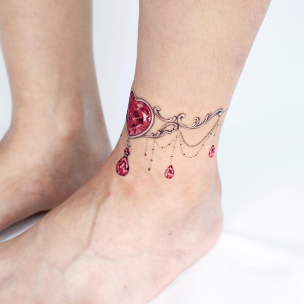 Minimalist Anklet Tattoo With Elephant And Clown Charms