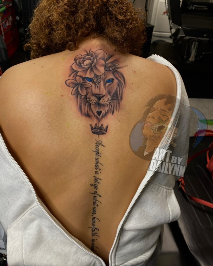 Ornamental Tribal-Inspired Spine Tattoo