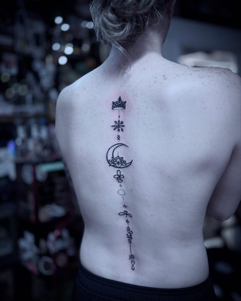 Delicate Floral Vine Spine Tattoo