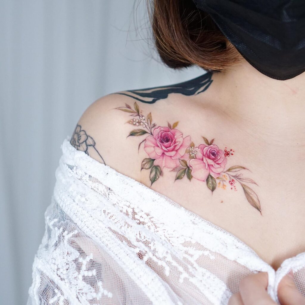 Personalized Name And Flower Collarbone Tattoo