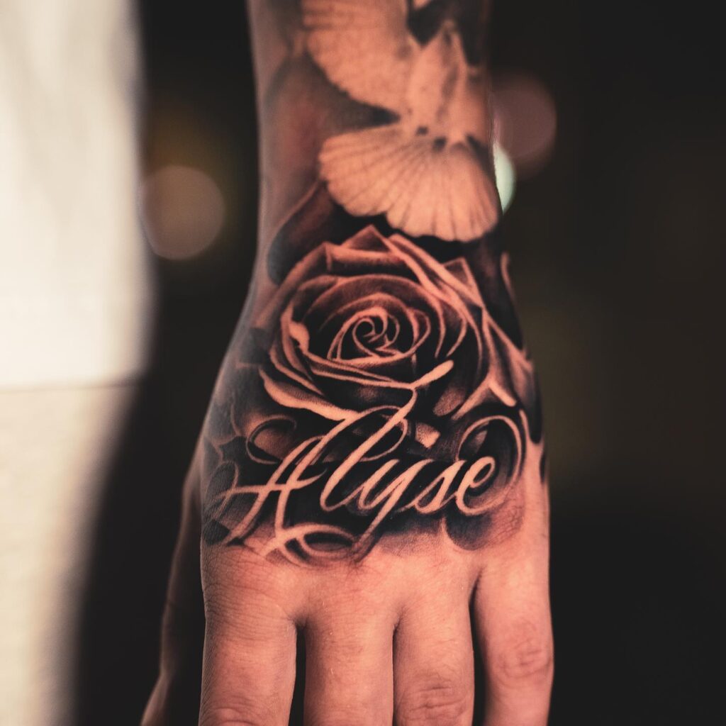 Name Forearm Bold Script Tattoo