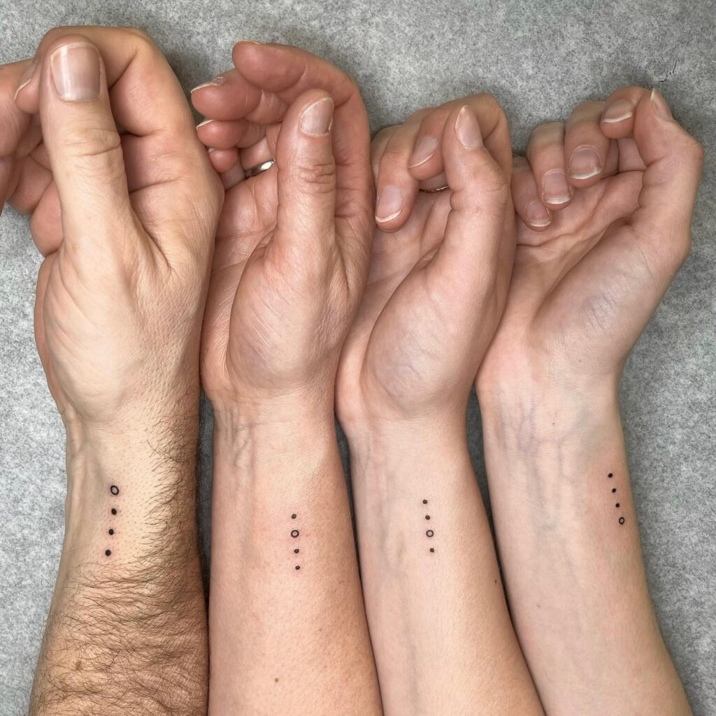 Sacred Geometry Dotwork Ring matching family tattoo