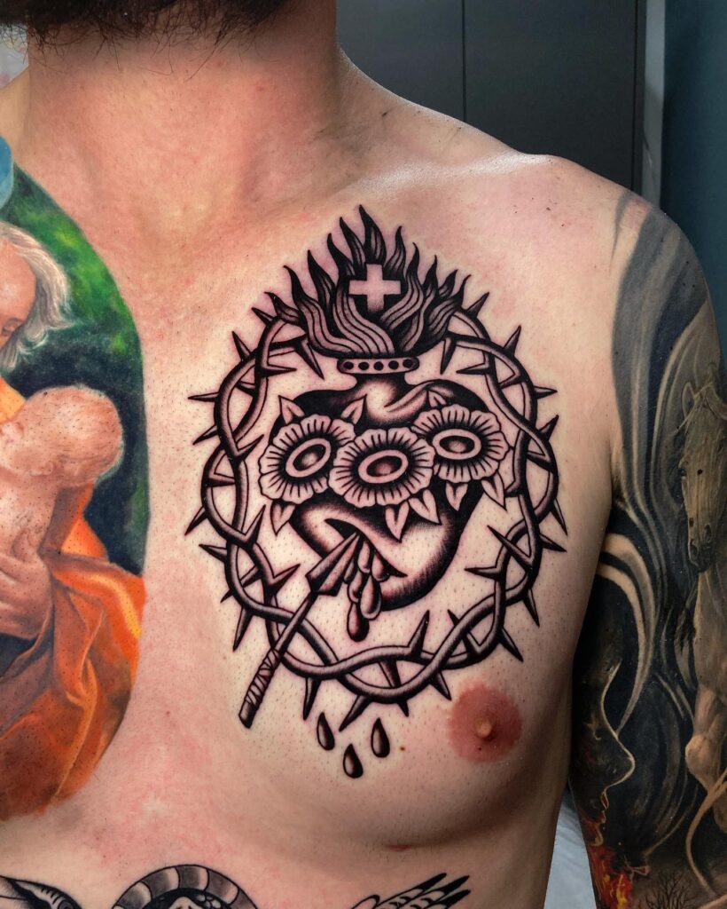 Matching Sacred Heart Floral Tattoos on Inner Arms sacred heart tattoo ideas tattoo