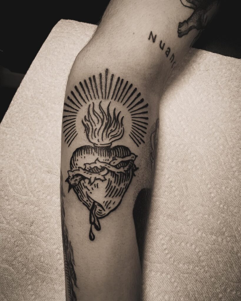 Sacred Heart with Eye, Lilies, and Flames Tattoo sacred heart tattoo ideas tattoo