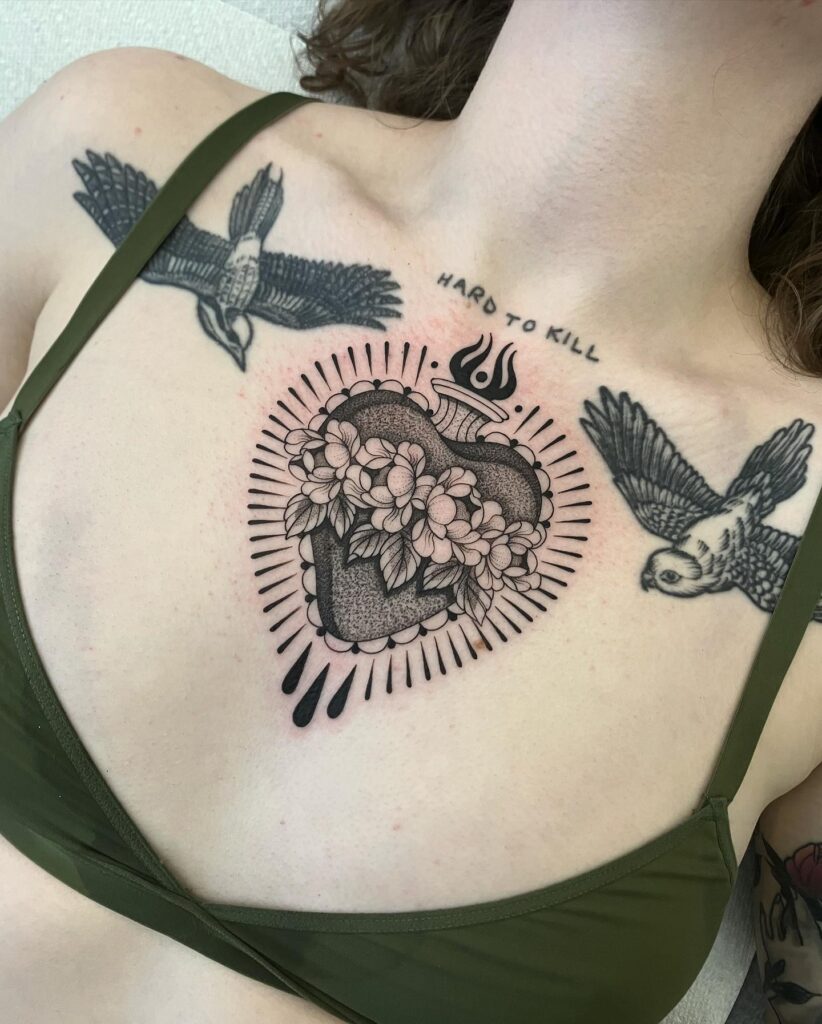Sacred Heart with Swords and Crown of Thorns Tattoo sacred heart tattoo ideas tattoo