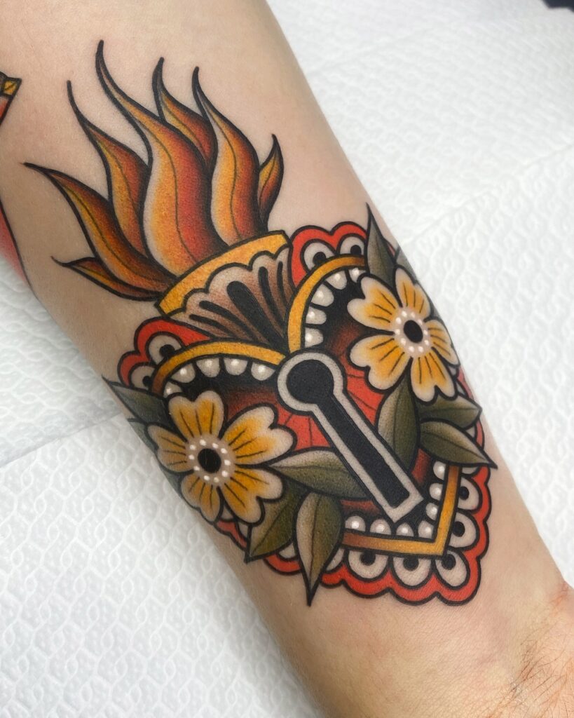Traditional Sacred Heart with Flowers and Flames Tattoo sacred heart tattoo ideas tattoo