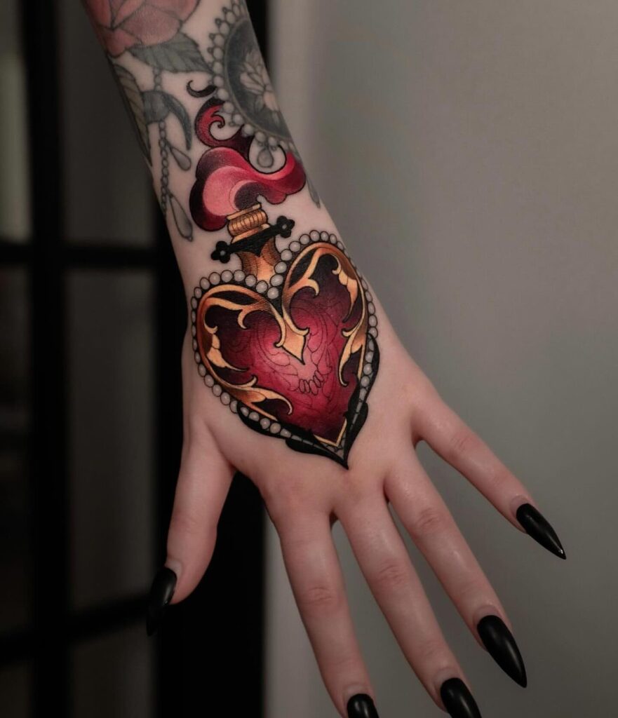 Sacred Heart with Roses, Lilies, and Flames Tattoo sacred heart tattoo ideas tattoo