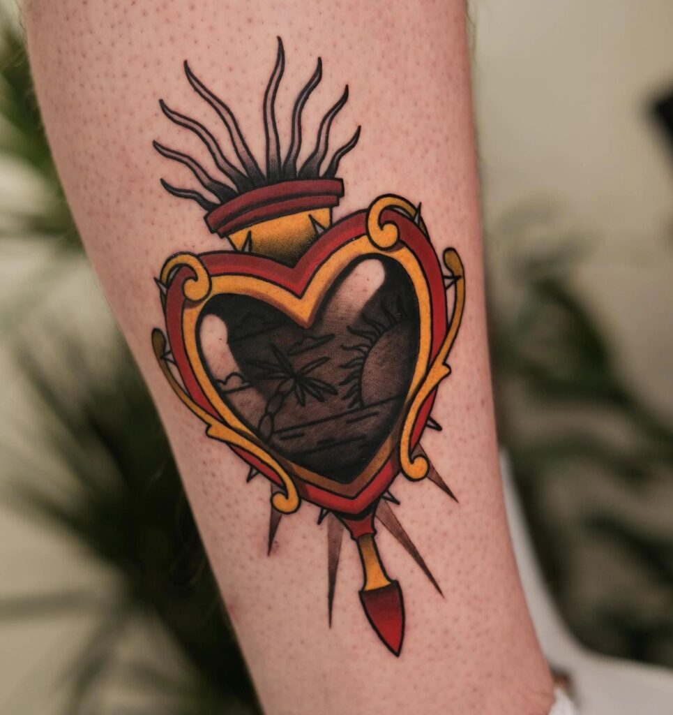 Sacred Heart with Sword Tattoo sacred heart tattoo ideas tattoo