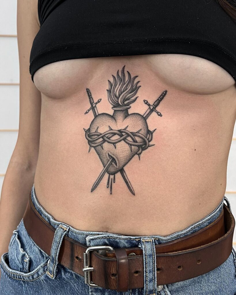 Sacred Heart with Flowers and Flame Tattoo sacred heart tattoo ideas tattoo