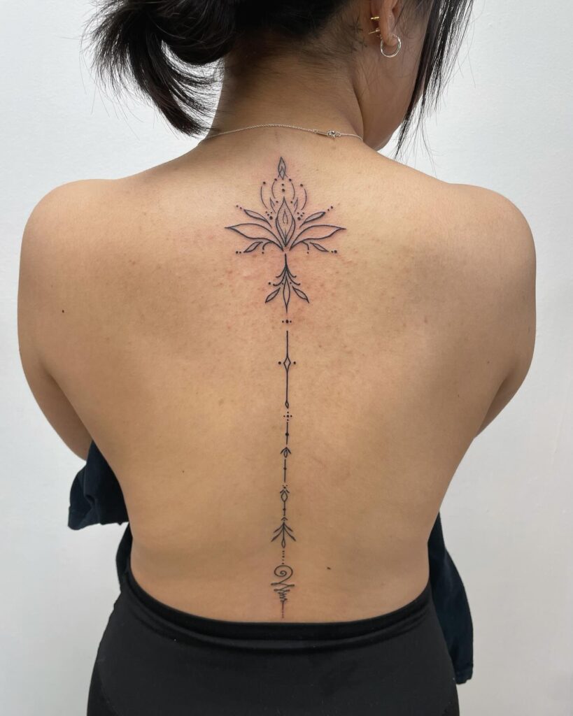 Elegant Floral Spine Tattoo